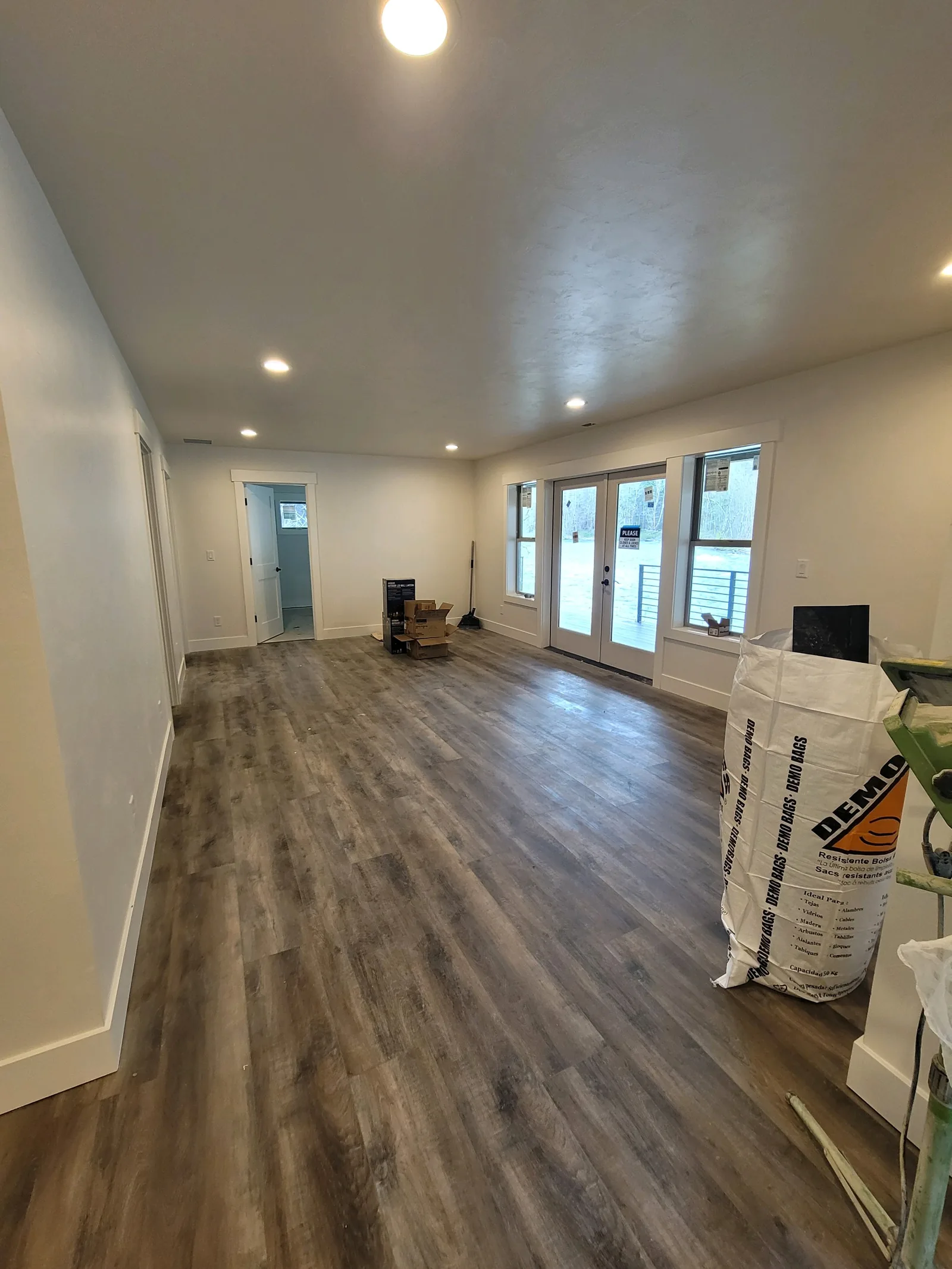Finished basement remodel with new flooring