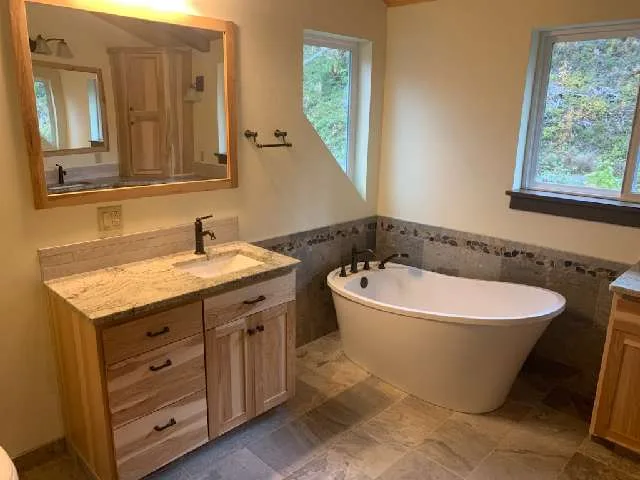 Master bathroom remodel with freestanding tub by OJEG Construction